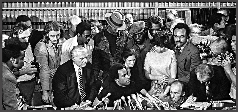 Newton-press-conference-photo.png