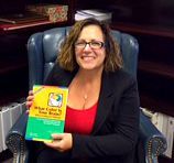 Denise-with-New-Book-jpg.jpg